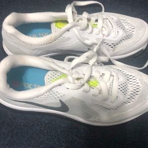 Nike tennis shoes, black , white and neon yellow